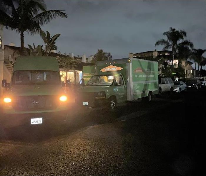 SERVPRO truck outside a home at night 